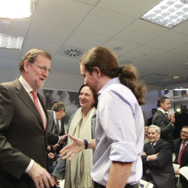 Mariano Rajoy junto al líder de Podemos, Pablo Iglesias. EUROPA PRESS