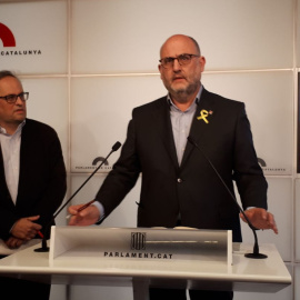 Els diputats de JxCat Quim Torra i Eduard Pujol, en compareixença al Parlament aquest divendres. JxCat.