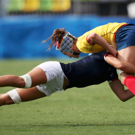 Guiglion y Paula Medin, durante el partido. REUTERS/Alessandro Bianchi