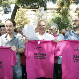 El secretario general de Podemos, Pablo Iglesias y el cabeza de lista de Catalunya Sí que es Pot, Lluís Rabell.-Andreu Dalmau (EFE)