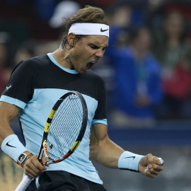 Rafa Nadal celebra un punto ante Karlovic. /REUTERS