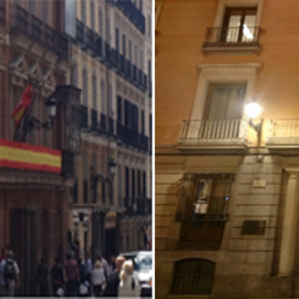 A la izquierda, los balcones de los despachos del PP en la Junta Municipal de Madrid Centro. A la derecha, la bandera indígena colgando de las oficinas de Ahora Madrid.