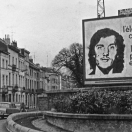 Valla publicitaria en Bruselas sobre el asesinato de Puig Antich.- CRAI-Biblioteca Pavelló República (UB)