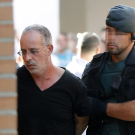 El presunto autor del asesinato de Eva Blanco en Algete (Madrid) en 1997, es trasladado la Guardia Civil de Madrid.- EFE/J.J. Guillén