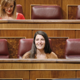 La portavoz adjunta en el Congreso de Vox, Macarena Olona, en su escaño. E.P./J.Hellín/Pool