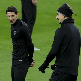 Di María e Ibrahimovic, ayer en el césped del Bernabéu. /EFE