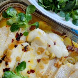 Merluza al horno con patatas.