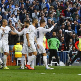 El Real Madrid celebra un gol en el partido ante el Getafe. EFE/J.P.GANDUL