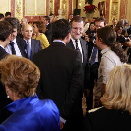 Pablo Iglesias junto a Mariano Rajoy durante el homenaje a la Constitución. EP