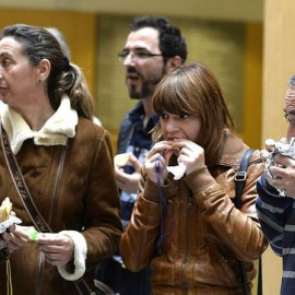 Varios trabajadores en un periodo de descanso por refrigerio. EFE