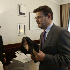 El ministro de Justicia, Rafael Catalá, formaliza su acta de diputado hoy en el Congreso. EFE/Ángel Díaz