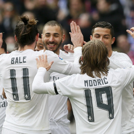 Los jugadores del Real Madrid celebran uno de los goles al Sporting. / EFE