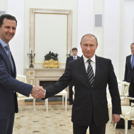 El presidente sirio Bashar al-Assad y el presidente ruso, Vladimir Putin, en un encuentro en el Kremlin en octubre de 2015. REUTERS/Alexei Druzhinin/RIA Novosti/Kremlin