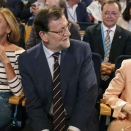 Cospedal, Rajoy y Cifuentes en un acto del PP. EFE