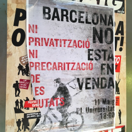 A poster reading “Barcelona is not for sale” advertises a rally to protest against privatisation in Barcelona’s University Square, in the Eixample district, June 18, 2019. Thomson Reuters Foundation/Sophie Davies