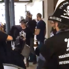 Imagen de la protesta de miembros de Attac en Madrid