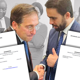 El ministro de Asuntos Exteriores, José Manuel Albares, con el embajador de Afganistán en España, Mohammad Rahim Peerzada, con los documentos antes y después del Cuerpo Diplomático acreditado en España