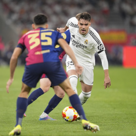 (Foto de ARCHIVO)Raúl Asencio, en una imagen de archivo, durante un partido con el Real Madrid.