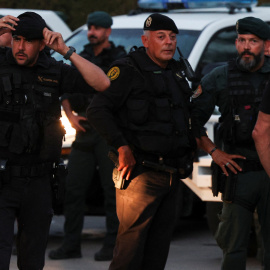 Police officers gather, amid anti-migrant unrest following an attack on an elderly man by unknown assailants earlier in the week, in Torre Pacheco, Spain, July 13, 2025. REUTERS/Violeta Santos Moura