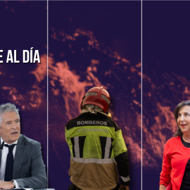 El ministro de Interior, Fernando Grande-Marlaska, y la ministra de Defensa, Margarita Robles, junto a una bombero.