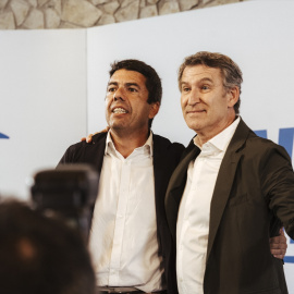 El presidente del Partido Popular, Alberto Núñez Feijóo, y el expresident valenciano Carlos Mazón.