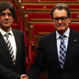 Carles Puigdemont i Artur Mas el 10 de gener del 2016, quan el primer va ser investit president de la Generalitat.