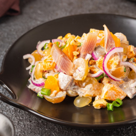 Ensalada de arenque y mandarina.