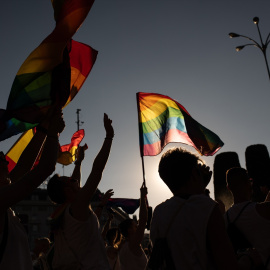 Varias personas con banderas LGTBI durante la manifestación estatal del Orgullo LGTBI+ 2024, a 6 de julio de 2024, en Madrid