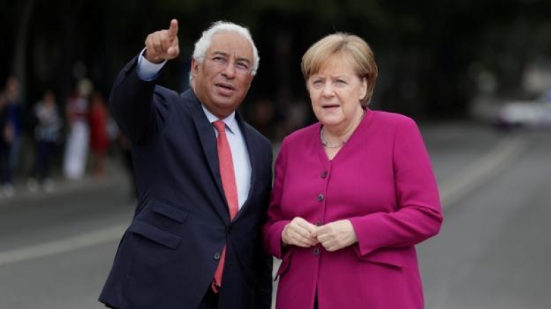 Antonio Costa y Angela Merkel - REUTERS