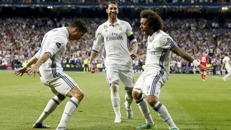 Cristiano Ronaldo celebra un gol, durante su etapa en el Real Madrid, junto Marcelo y Sergio Ramos. / EFE