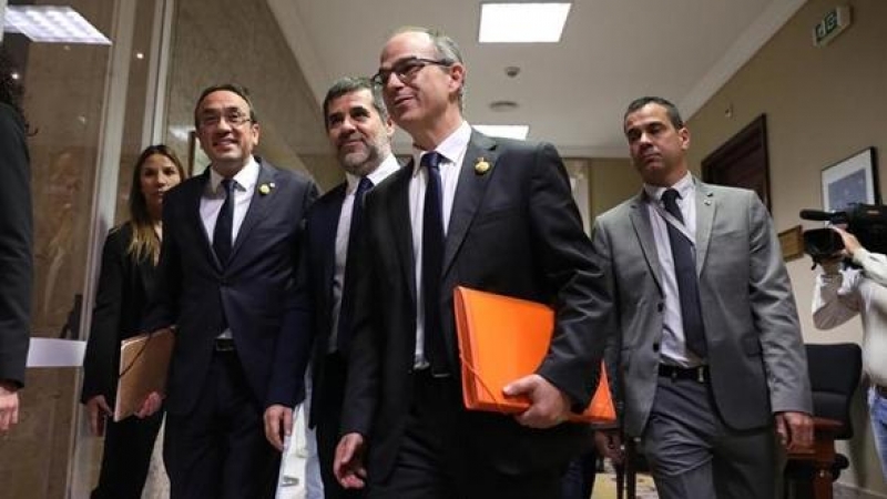 Jordi Sànchez, Josep Rull y Jordi Turull, a su llegada al Congreso. - EUROPA PRESS