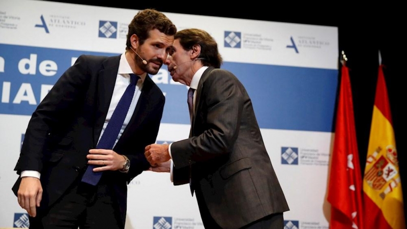 GRAF132. POZUELO DE ALARCÓN (C. DE MADRID), 28/01/2020.- El presidente del PP, Pablo Casado (i), y el expresidente del Gobierno, José María Aznar, participan este martes en la Universidad Francisco de Vitoria, en un foro del Instituto Atlántico de Gobiern