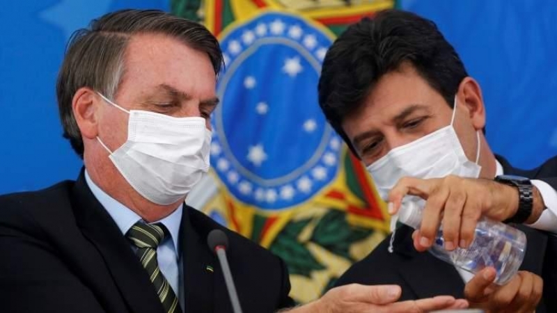 Luiz Henrique Mandetta y Jair Bolsonaro. REUTERS