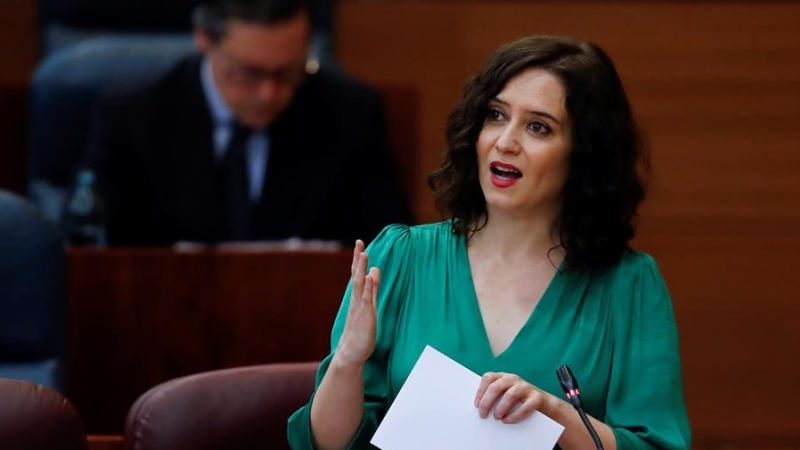 La presidenta regional, Isabel Díaz Ayuso, durante su intervención en el pleno de la Asamblea que reanuda este viernes en una de la sesión reducida la sesión telemática del jueves, suspendida por problemas técnicos. EFE/Chema Moya POOL