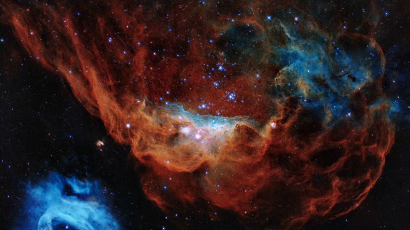 La nebulosa gigante NGC 2014 y su vecina, NGC 2020, que se integran en la Gran Nube de Magallanes. / ESA/NASA