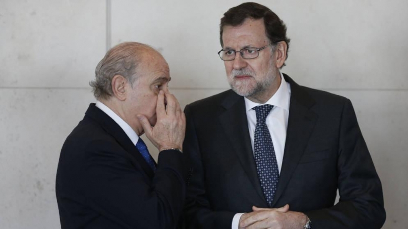 El expresidente del Gobierno Mariano Rajoy y el exministro del Interior Jorge Fernández Díaz en una imagen de archivo. EFE