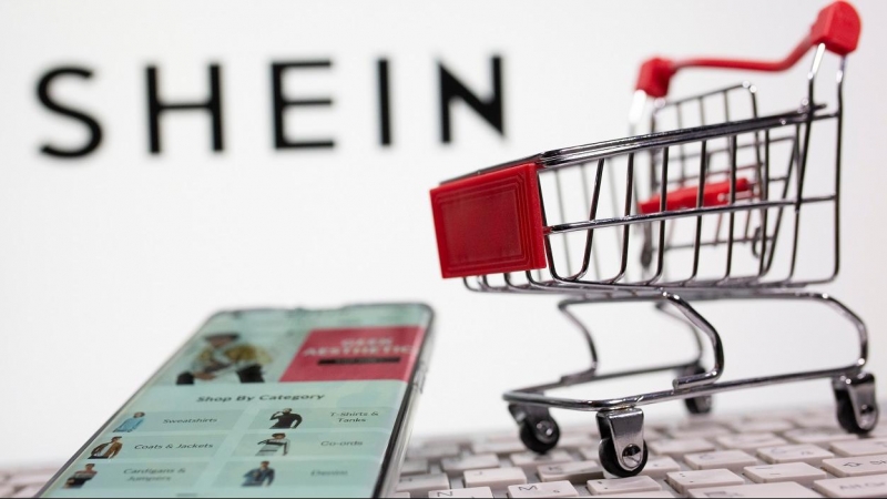 El logo de Shein, en una ilustración con un carrito de la compra y un teclado.. REUTERS/Dado Ruvic/Illustration