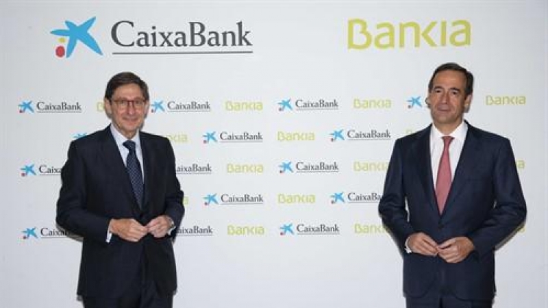 El presidente de Bankia  José Ignacio Goirigolzarri y el consejero delegado de la nueva entidad, Gonzalo Gortázar, en la sede de Caixabank, en Valencia 18 de septiembre de 2020.