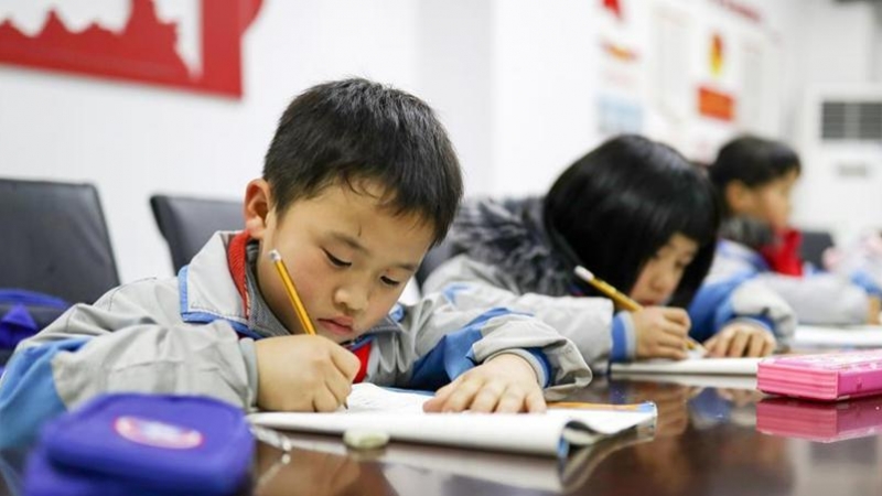 Imagen de unos niños en la escuela en China.