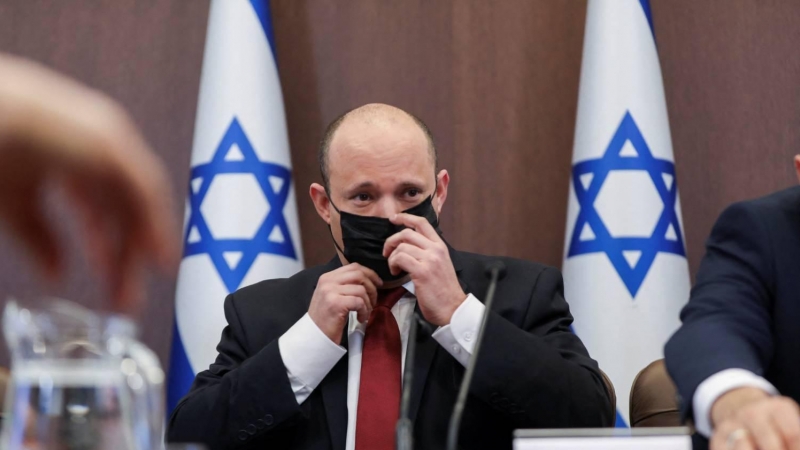 El primer ministro israelí, Naftali Bennett, con mascarilla durante la reunión del Gobierno este 19 de diciembre de 2021.