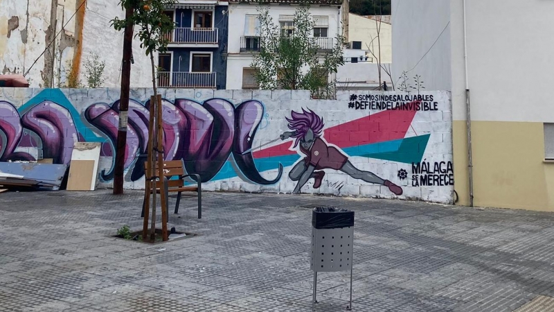 Dibujo en un muro de Málaga, en el barrio de Las Lagunillas, en defensa de La Invisible.