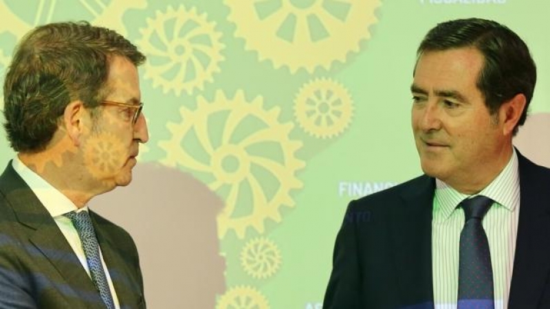 30/6/2022 Alberto Núñez Feijóo saluda al presidente de la Confederación Española de Organizaciones Empresariales, Antonio Garamendi, en un acto de la Asociación de Trabajadores Autónomos el pasado martes en Madrid.