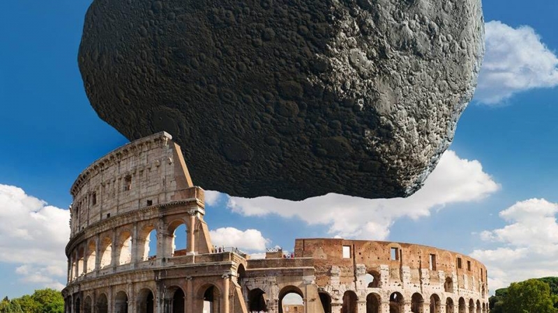 Asteroide Dimorphos a escala con el coliseo de Roma.