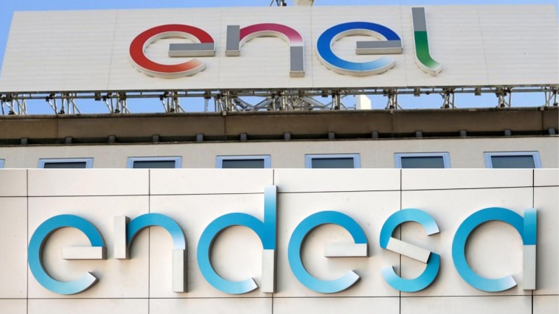 Los logos de la energética italiana semipública Enel y de su filial española Endesa, en sus respectivas sedes en Milán y en Madrid. REUTERS