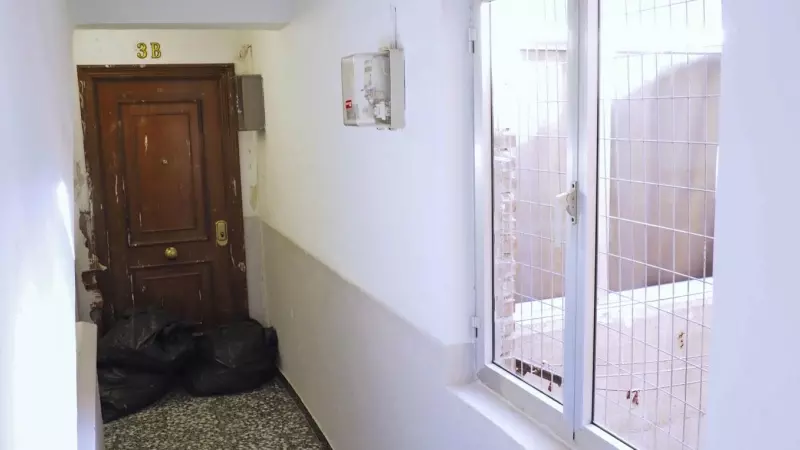 Vista de la vivienda donde ha sido encontrado el cadáver de una mujer en el interior y que tenía la entrada tapiada.