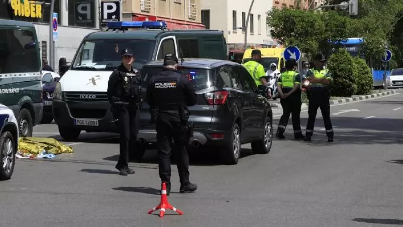 27/04/2023 - Agentes de la Policía Nacional y de la Guardia Civil, en el paseo de la Extremadura en Madrid, donde este jueves han muerto dos personas atropelladas.