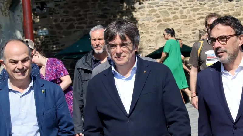 Carles Puigdemont arribant aquest divendres a Cotlliure acompanyat de Jordi Turull i Josep Rius.