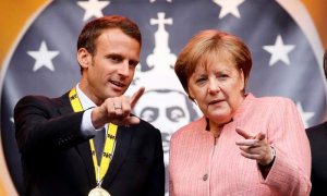 Merkel y Macron en Aquisgrán. (RONALD WITTEK | EFE)