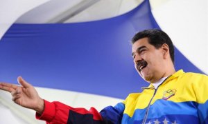 otografía cedida por la oficina de Prensa de Miraflores, que muestra al presidente de Venezuela, Nicolás Maduro, encabezando el acto de graduación de Bomberos Forestales y Guardaparques este jueves, en Caracas (Venezuela). EFE