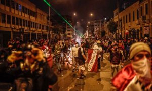 Cientos de manifestantes durante una protesta contra el nuevo Gobierno de Perú en el centro de Lima, a 12 de diciembre de 2022.